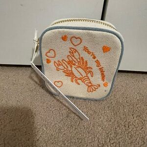 Friends TV Show Stoney Clover Lane Cream and Orange Travel Bag